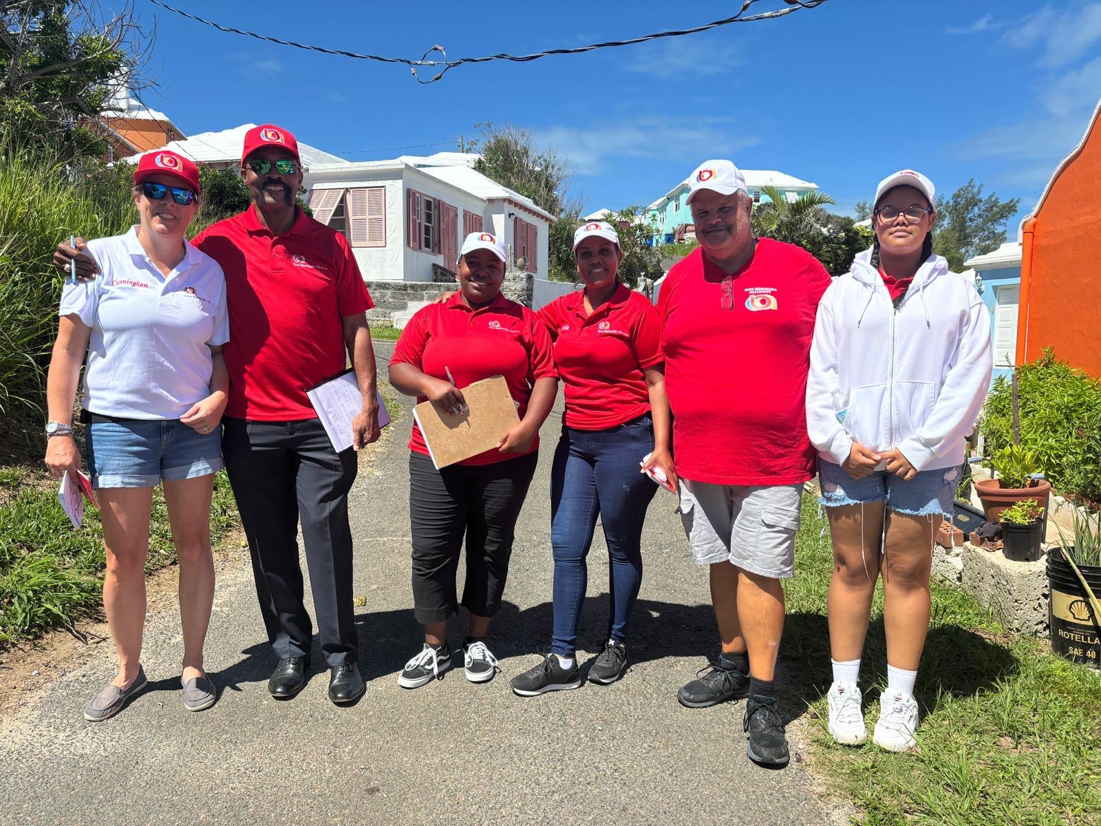 Victoria with a One Bermuda Alliance canvassing team on a residential street