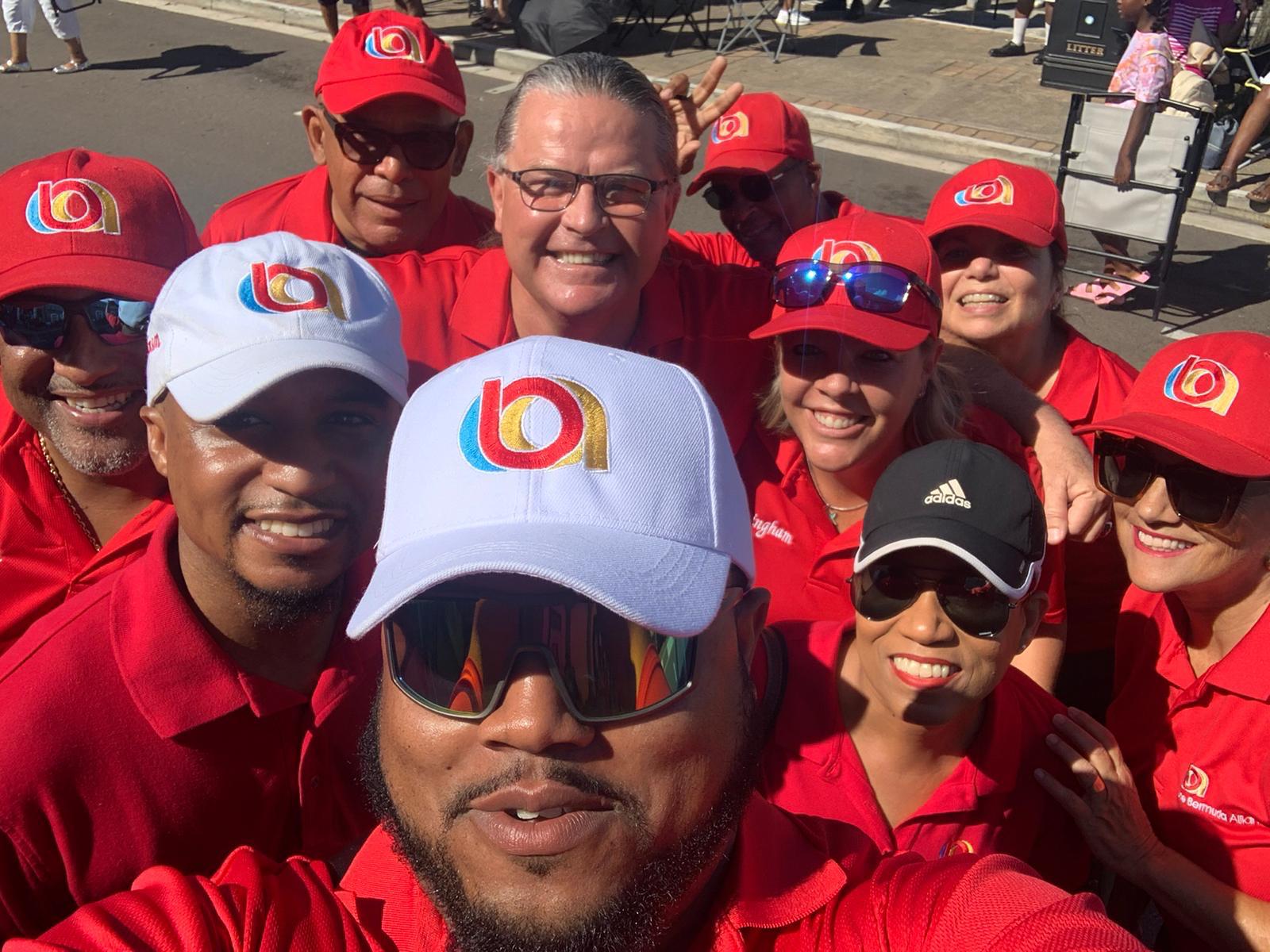 Victoria in a group selfie with One Bermuda Alliance members at a parade